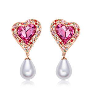 Aretes de corazón con cristales Swarovski rosa y multicolor, con perla de agua dulce - Cherine Jewelry