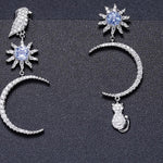 Aretes de Sol, Luna, Ave y Gato de Topacio Azul Cielo - Cherine Jewelry