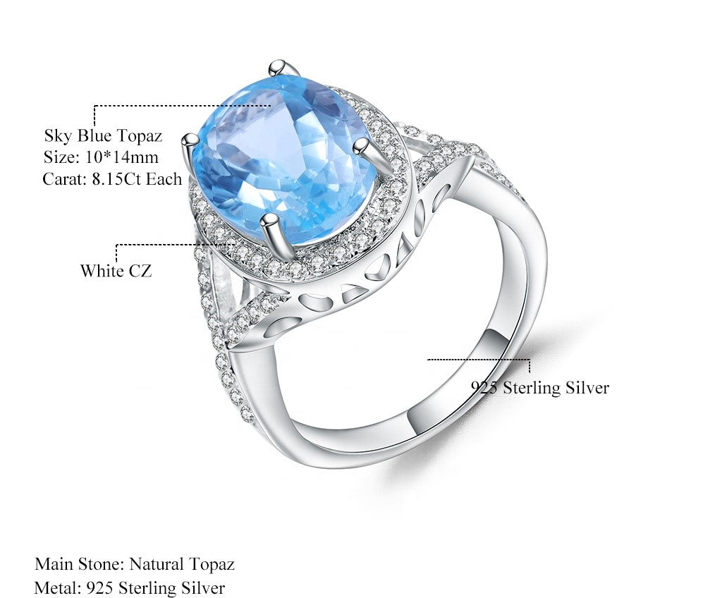 Anillo de Topacio azul cielo ovalado rodeado de Zirconia cúbica - Cherine Jewelry