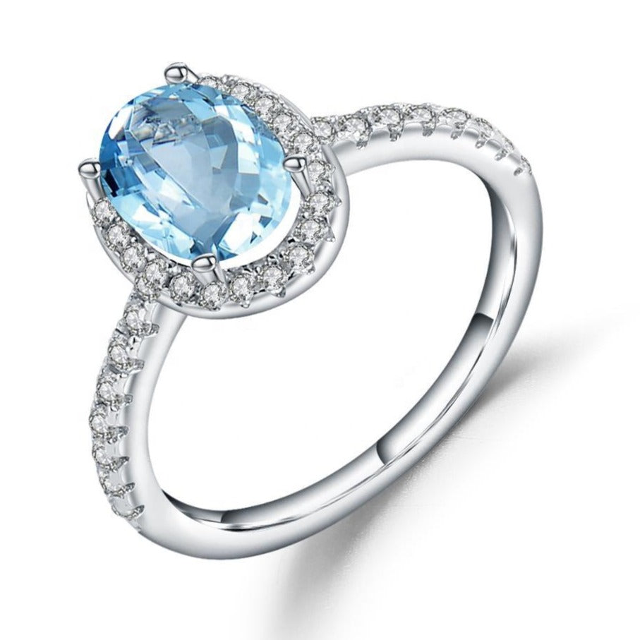 Anillo de Topacio azul cielo con aro de Zirconia cúbica - Cherine Jewelry