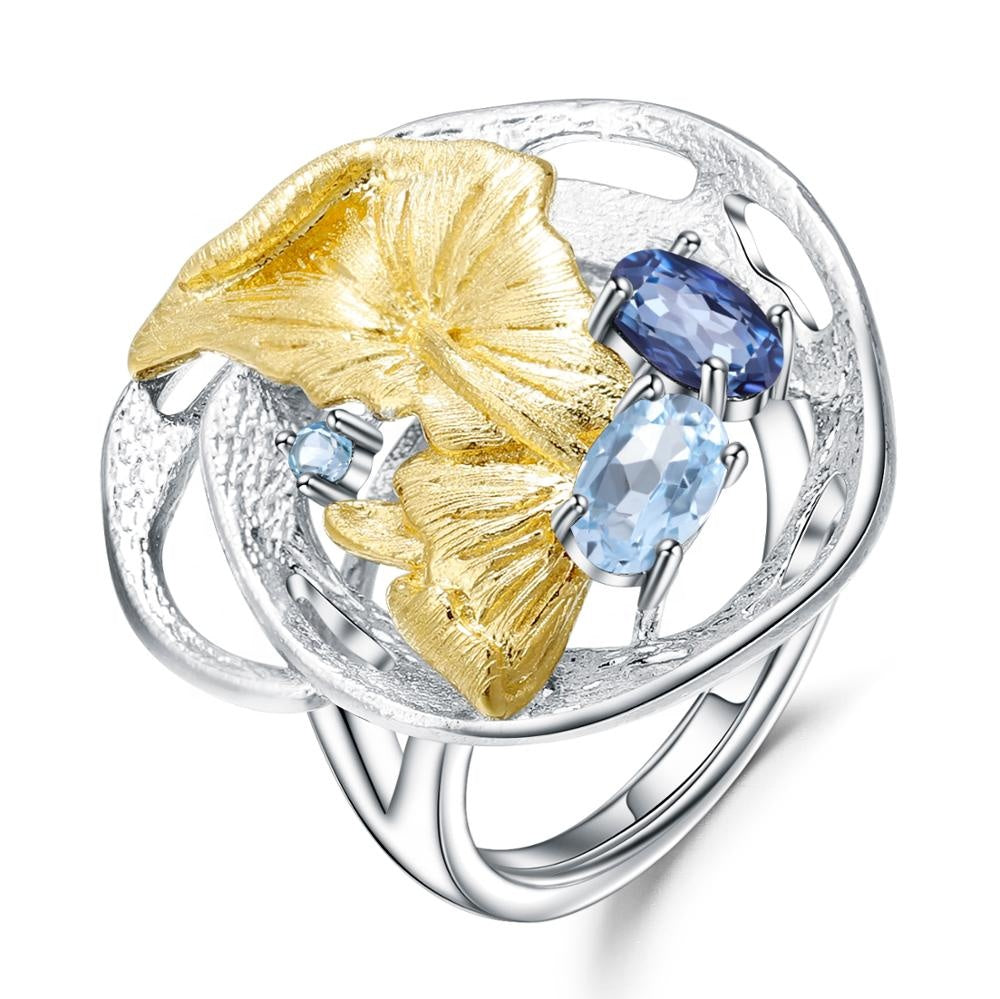 Anillo de flores de Topacio Azul Suizo y Cuarzo Místico - Cherine Jewelry