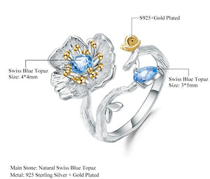 Anillo de flor con caracol de Topacio Azul Suizo - Cherine Jewelry