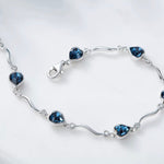 Brazalete de corazones azul marino de cristales Swarovski